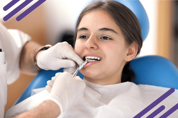 Girl in Orthodontic Treatment with Clear and Traditional Metal Braces