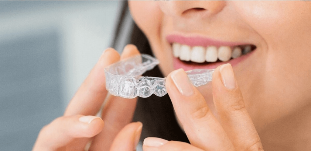 Girl with Invisalign Clear Aligners